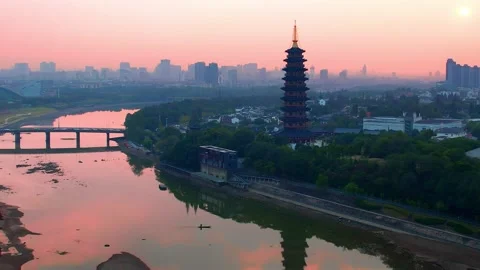 Aerial view of wanfo old tower in midtown of jinhua at sunset Stock Footage 197219048