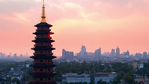 Aerial view of wanfo old tower in midtown of jinhua at sunset Stock Footage 197273547