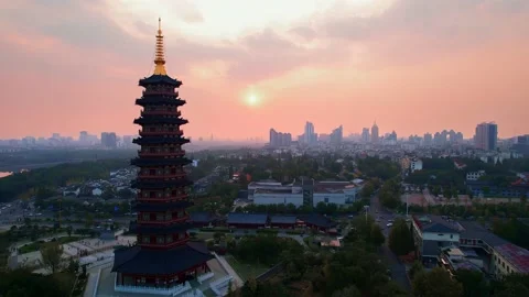 Aerial view of wanfo old tower in midtown of jinhua at sunset Stock Footage 197908828