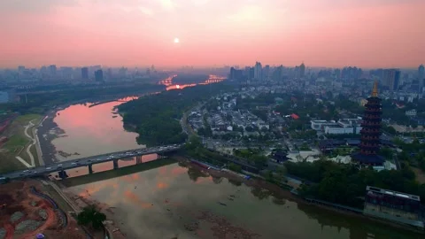 Aerial view of wanfo old tower in midtown of jinhua at sunset Stock Footage 197908841