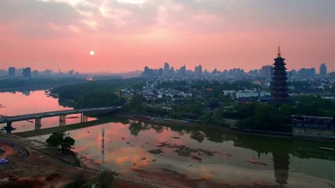 Aerial view of wanfo old tower in midtown of jinhua at sunset Stock Footage 197909082