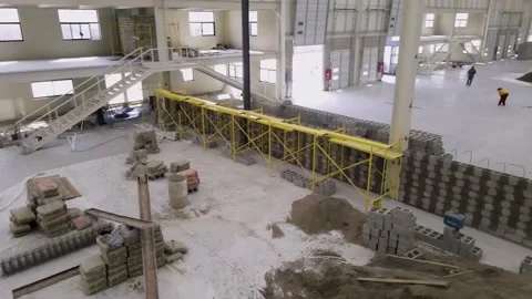 Aerial view warehouse construction people working Stock Footage 155366179