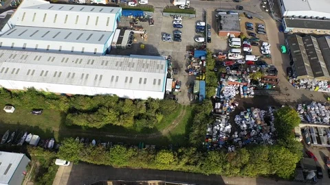 Aerial view of a warehouse destroyed by fire and filled with waste junk, Margate Stock Footage 120685821