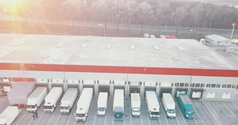 Aerial view of the warehouse of goods. Logistic center in the industrial area Stock Footage 144496383
