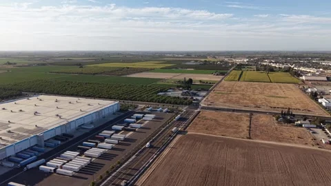 Aerial view of a warehouse logistics hub in Turlock California Stock Footage 345802305
