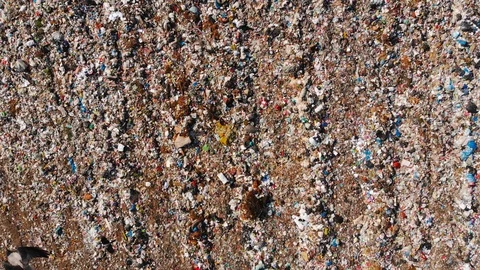 Aerial view of waste garbage dump household pile plastic trash. Burning dump Stock Footage