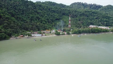 Aerial View of Waste Sorting Facility and Trash Burning in Coastal Malaysia Stock Footage 345381751