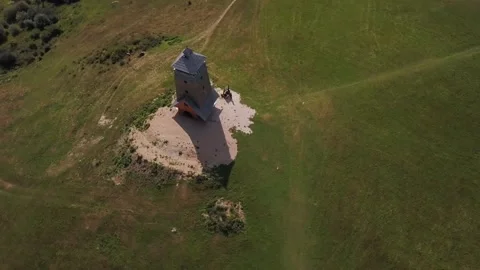 Aerial view of a watch tower - orbiting Stock Footage 153319551