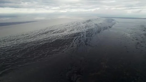 Aerial view of water formation at river estuary at sunset, Akurey, Iceland. Stock Footage 242319009