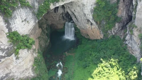 Aerial View of Waterfall in Cave at Yangpidong, Guizhou Vídeos de archivo 345152479