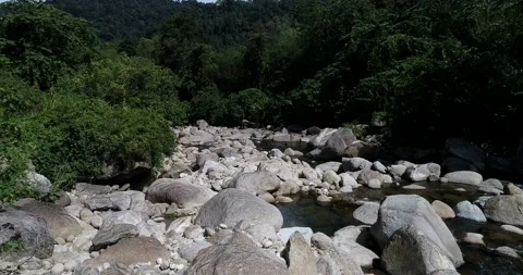 Aerial view waterfall in deep mountain rain forest with rocky Thailand Stock Footage 134448391