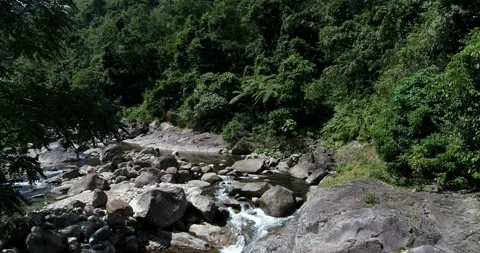 Aerial view waterfall in deep tropical rain forest with mountain Stock Footage 134447631