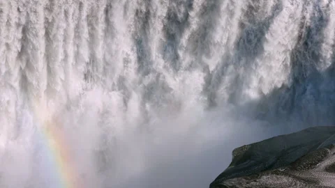 Aerial view of waterfall Dettifoss shrouded in fog and rugged terrain Stock Footage 345168317