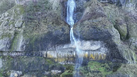 Aerial View of a Waterfall Flowing Off a Cliff in the Columbia River Gorge Stock-Footage 297327861