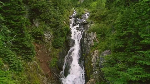 Aerial view of a waterfall near Hyder, Alaska. 動画素材 153282653