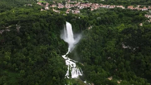 Aerial View of Waterfall with Rainbow in Lush Green Forest Landscape 4K Stock Footage 331862109