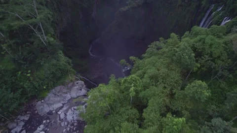 Aerial view of waterfall, river, forest in Tumpak Sewu, East Java, Indonesia. Stock Footage 279736647