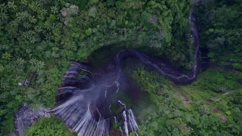 Aerial view of waterfall, river, forest in Tumpak Sewu, East Java, Indonesia. Stock Footage 279736833