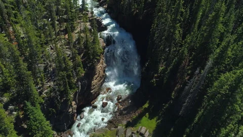 Aerial view of a waterfall in the rugged Beartooth Mountains, Montana Stock Footage 267128863