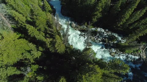 Aerial view of a waterfall in the rugged Beartooth Mountains, Montana Stock Footage 267129063