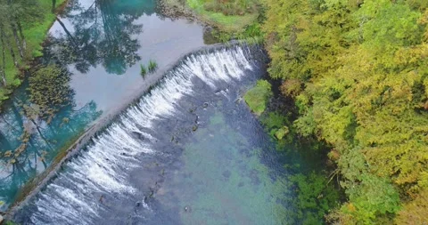 Aerial view of waterfall at the source of Krupa River, Slovenia Stock Footage 324524875