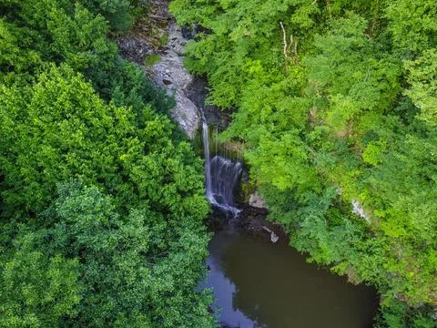 Aerial view of the waterfall in spring 库存照片