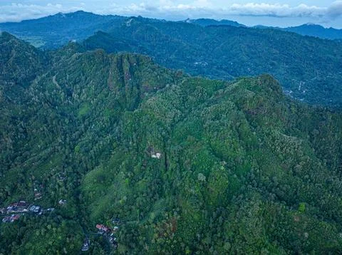Aerial view The waterfall stream flows into the mountain gorge in a long path Photos