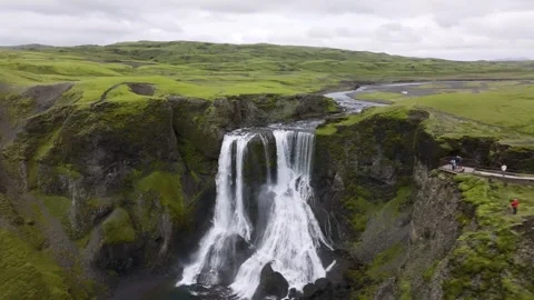 Aerial view of waterfall with viewing platform in Iceland. Stock Footage 337459930