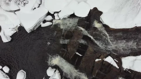 Aerial view of Waterfall in winter. A long waterfall in the Jizera Mountains. Video stock 148082263