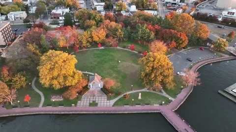 Aerial View of a Waterfront Park in Fall Colors Stock Footage 220638271
