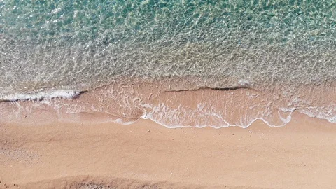 Aerial View of Wave on the Sandy Beach Stock Footage 127981286