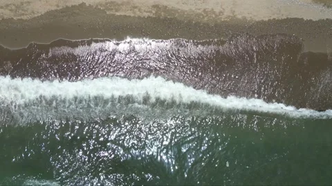 Aerial view of the waves and the beach in Spain. Stock Footage 267889321