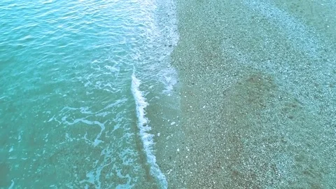 Aerial view waves and sandy beach Stock Footage 83990079