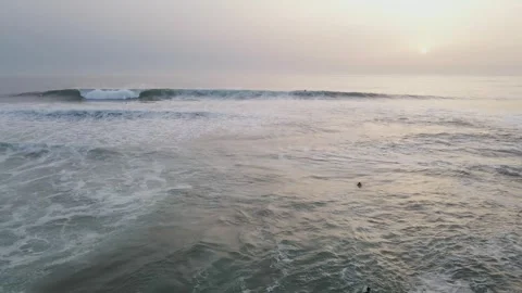 Aerial view of waves and surfers, Portugal. Stock Footage 321494286