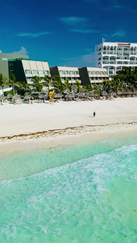 Aerial view of waves approaching the beach in the Caribbean Stock Footage 342090338