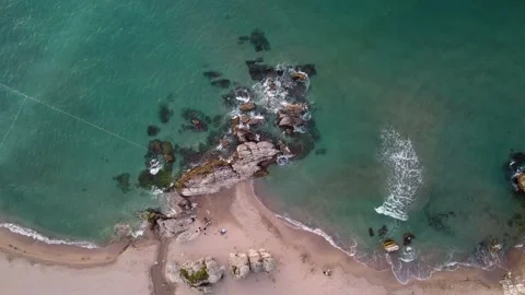 Aerial view of waves at beach and rocks Stock Footage 144592167