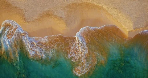 Aerial View of Waves on the Beach Stock Footage 84665695