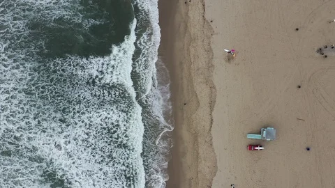 Aerial view of waves on a beach Stock Footage 101562758