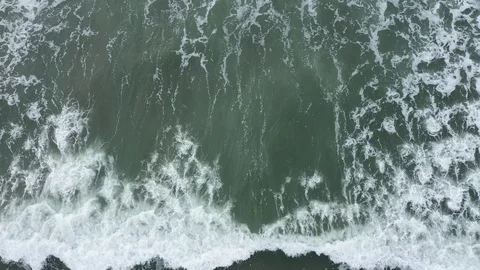 Aerial view of waves on a beach Stock Footage 101562770