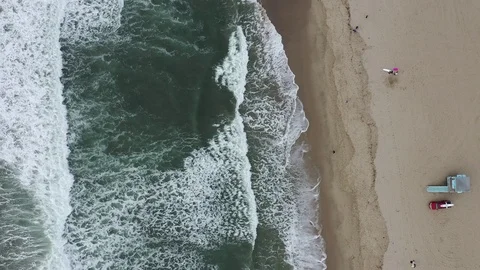 Aerial view of waves on a beach Stock Footage 101562778