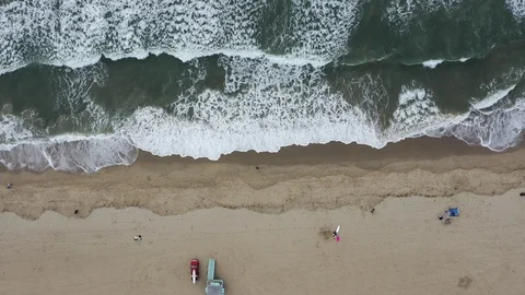 Aerial view of waves on a beach Stock Footage 101563078
