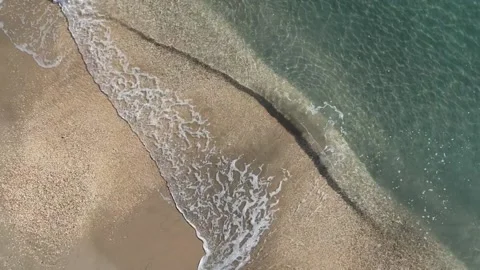 Aerial view of waves on the beach Stock Footage 172605985