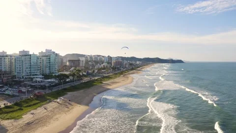 Aerial view of waves at brava beach during scenic sunset, Itajaí, Brazil. Stock Footage 158574189