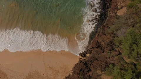 Aerial view waves break on beach shore Stock Footage 99157983