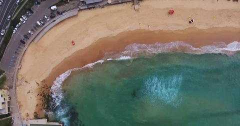 Aerial View Waves Break On White Sand Beach At Sunset Stock Footage 70826863