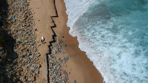 Aerial view waves break on white sand beach Stock Footage 94472543