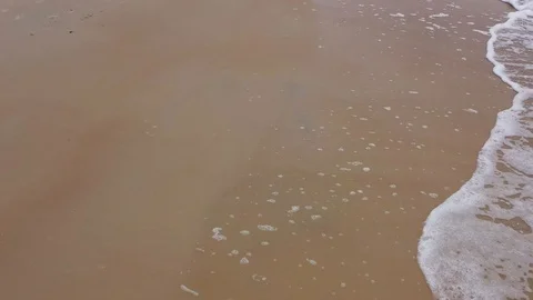 Aerial view waves break on white sand beach Stock Footage 116493141