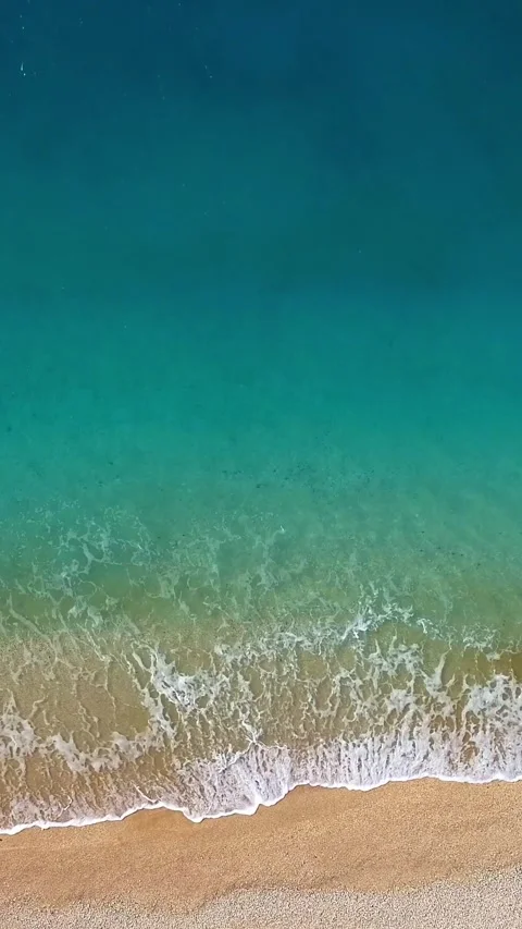 Aerial view of waves break on white sand beach. Perfect empty white sand beach 스톡 동영상 280166092