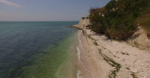 Aerial View of Waves Breaking on Beach 스톡 동영상 83018661