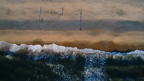 Aerial View of Waves Breaking on the beach Stock-Footage 97820755